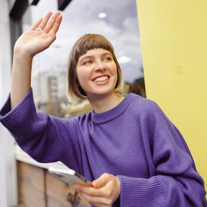 thumbnail woman waving hand freepik